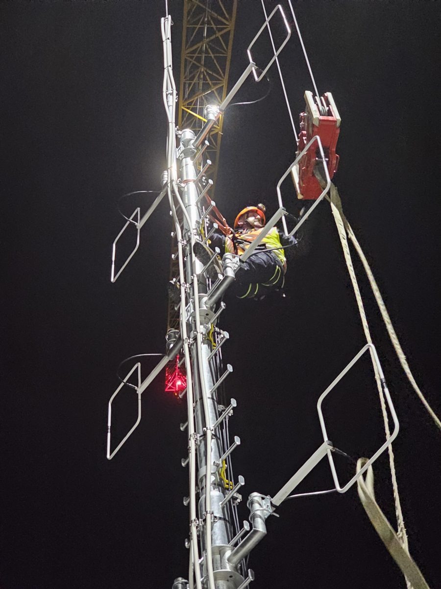 Installation of the new antenna mast at the designated location